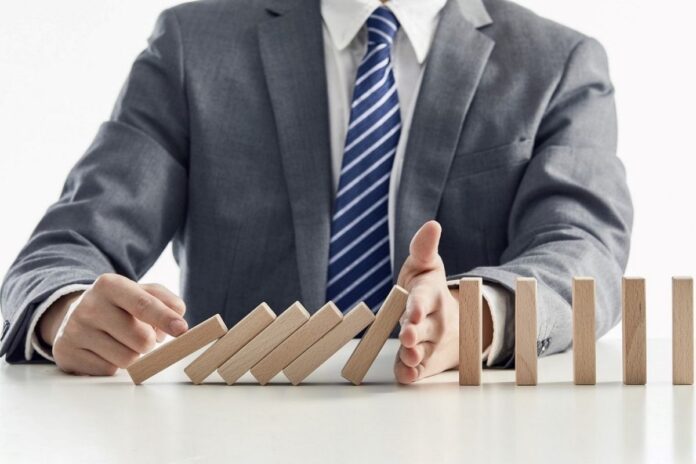 An insurance lawyer intervenes to stop dominos from falling An insurance lawyer intervenes to stop dominos from falling